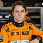 Oscar Piastri McLaren F1 driver 2026 season papaya orange suit cockpit