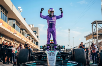 Kimi Antonelli celebrates pole position for the 2026 F1 Miami Grand Prix in his Mercedes W17, becoming the third driver in Formula 1 history after Ayrton Senna and Michael Schumacher to claim the first three poles of his career at three consecutive races