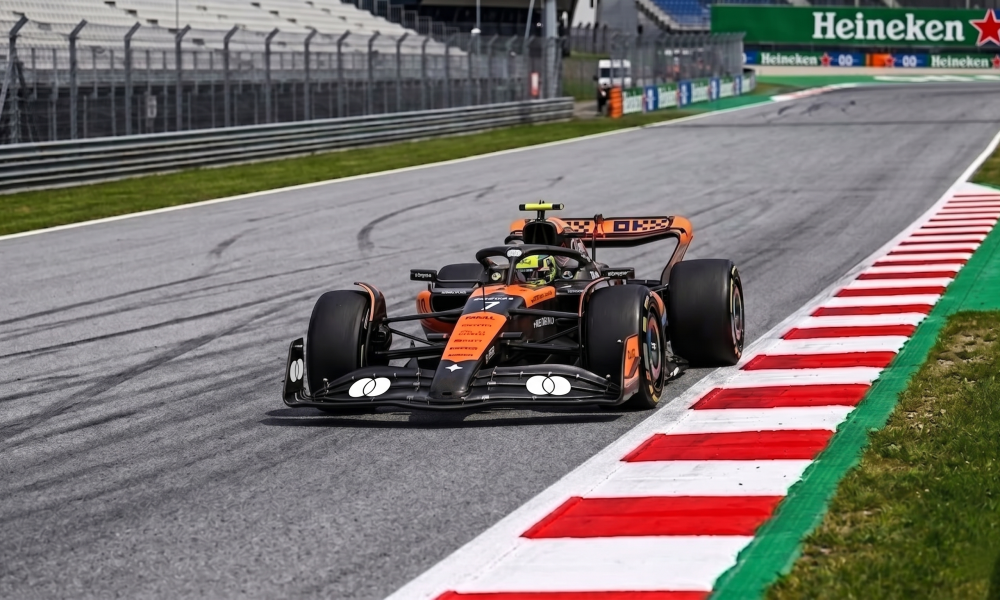 McLaren F1 car on track at Barcelona Circuit near the Heineken corner, 2026 Spanish Grand Prix Free Practice 2