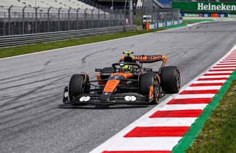 McLaren F1 car on track at Barcelona Circuit near the Heineken corner, 2026 Spanish Grand Prix Free Practice 2