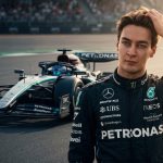 "Pensive Mercedes F1 driver George Russell stands on a race track at golden hour, hand in hair, with blurred Petronas car behind him."